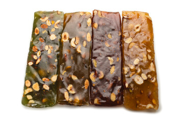 Turkish traditional delight with nuts isolated on white background.
