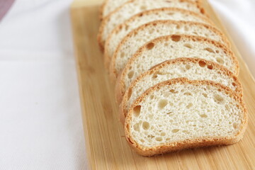 Fresh loaf bread on wooden board