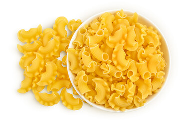 Pasta cornetti creste macaroni in bowl isolated on white background with clipping path and full depth of field. Top view. Flat lay