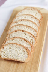 Fresh loaf bread on wooden board