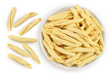 Typical Calabrian pasta called Maccheroncini or Maccheroni in ceramic bowl isolated on white background with clipping path. Top view. Flat lay