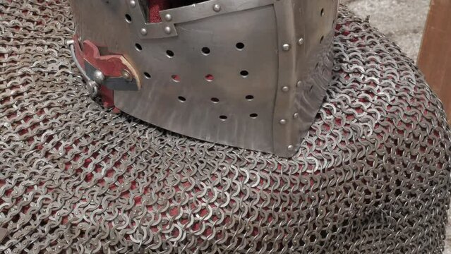 chain mail and medieval helmet, knight equipment historical reenactment