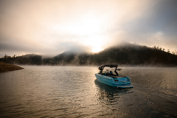 Great view on modern motor boat floating on water. Scenic view on the background