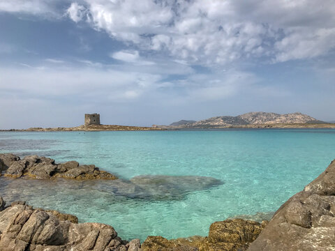 La Pelosa di stintino,la pelosa,plage,sardaigne,italie,voyage,vacances,tourisme,mer,sable,bord de mer,M&eacute;diterran&eacute;e,immense, &eacute;tendue,sable blanc, eau,cristalline, turquoise,sableux,rochers,la Torre del