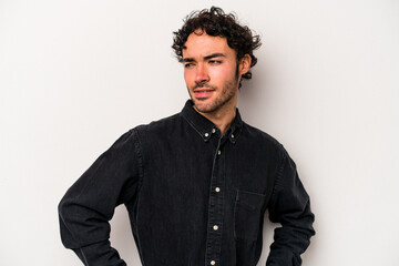 Young caucasian man isolated on white background confused, feels doubtful and unsure.