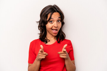 Young hispanic woman isolated on white background cheerful smiles pointing to front.