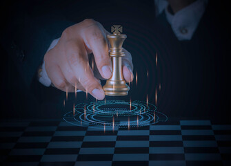 Businessman holding and throwing golden king chess to target for business winner with successfully in the competition with technology network background. Management and leadership strategy concept.