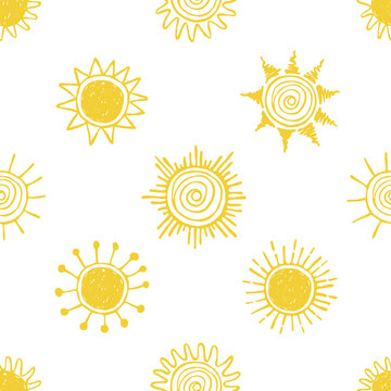 Seamless pattern with hand drawn yellow suns on white background. Design element for fabric, textile, wrapping paper.