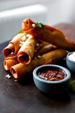 Flautas with Mole and Sour Cream