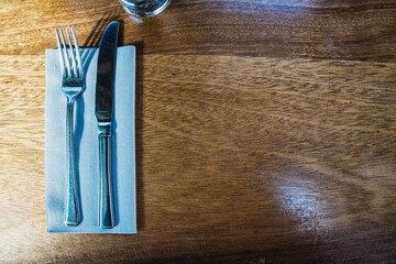knife and fork on a napkin