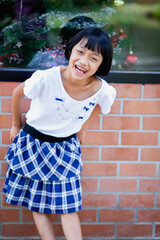 girl walking in the park happy bright cheerful white dress blue skirt