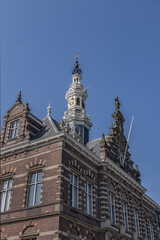 Fototapeta na wymiar Architectural fragments of old Amsterdam building: XIX century Neo-Renaissance-style building, former Town Hall and Archive of Amstel Community Amsterdam, The Netherlands.