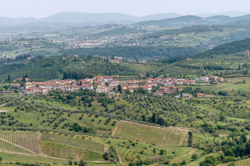 Fototapeta na wymiar Aerial view of Carmignano, Prato, Italy and the hamlet of La Serra, from the fortress