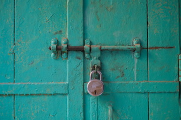 Old padlock on an old door in delhi India