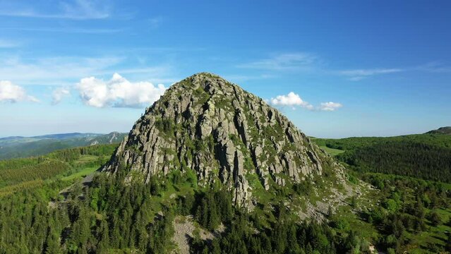 The rocky summit of Mont de Gerbier de Jonc in the French countryside in Europe, France, Ardeche, in summer on a sunny day.