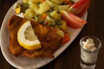 Breaded Pork Meat with Boiled Potatoes, Braga, Portugal.