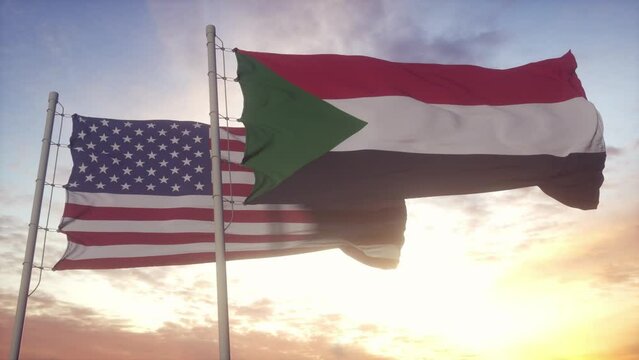 Sudan and United States flag on flagpole. Sudan and USA waving flag in wind. Sudan and United States diplomatic concept