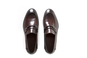 Classic modern male brown leather shoes isolated on white background. Top view.
