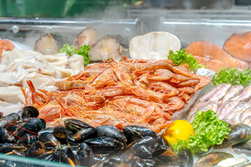 Fresh Fish at Seafood Market, Traditional Fish in Market. Fresh Sea Fish in on Showcase of Seafood Street Market.
