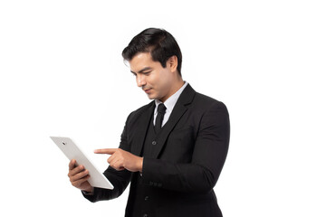 Portrait young businessman working on new tablet, mobile phone in white studio. Portrait of a confident business man in black suit feeling happy and smile holding tablet or mobile phone.