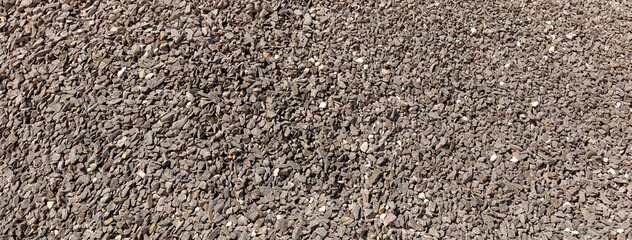 Full frame Texture of Gravel, broken basalt stones, Split, Coarse aggregate, stone abstract pattern...