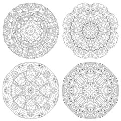 Hand drawn zentangle set of 4 mandalas for coloring page.