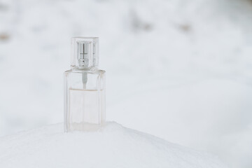 Fresh fragrance in a spray on the snow in winter