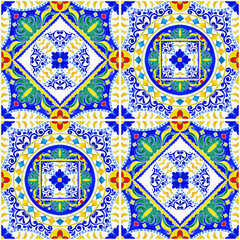 Seamless pattern of watercolor-painted multicolored mosaic tiles with hand-painted floral ornaments. Yellow, green, red, blue colors. In the style of traditional Spanish majolica ceramic painting