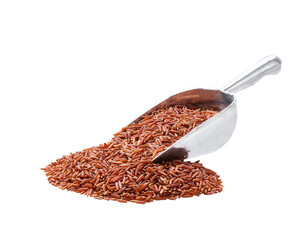 Small metal spoon or scoop with red rice seen isolated on white background.