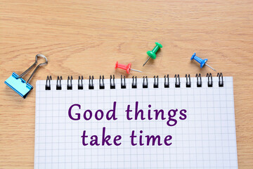 Good things take time text on notebook page