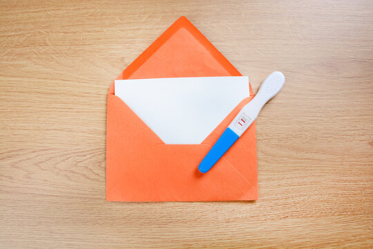 Empty white paper with pregnancy test