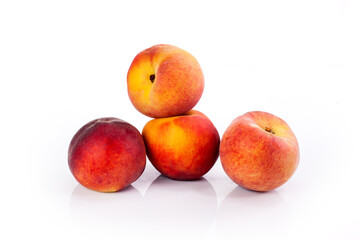 Fototapeta na wymiar Fresh peaches isolated on a white background