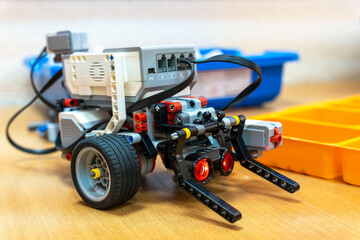 programmable children's robot assembled from designer parts