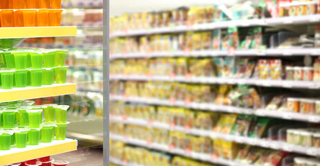 Choosing food from shelf in supermarket,vegetables in grocery section,Grocery stores