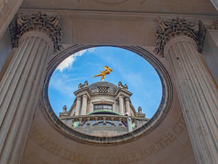The gilded bronze figure of Ariel on top of the Bank of England