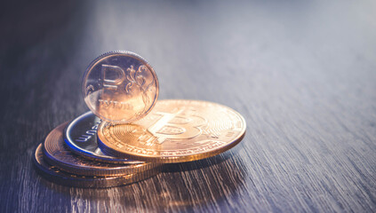 Russian rubles in coins and bitcoin gold coin. High quality photo