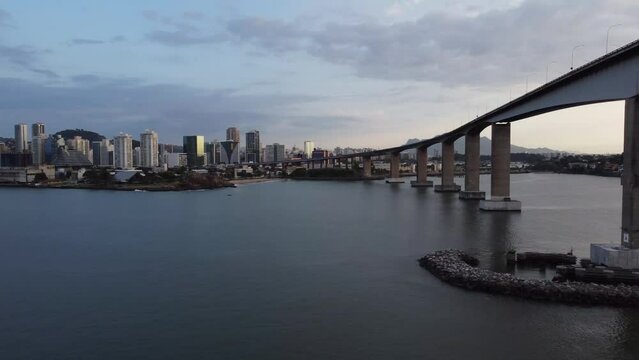 Beautiful aerial drone view passing under of the third bridge in Vit&oacute;ria, Espirito Santo, Brazil
