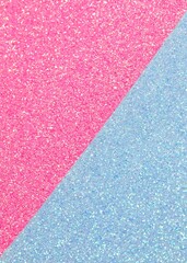 glittery background with half part of pink and half light blue which could symbolize half between...