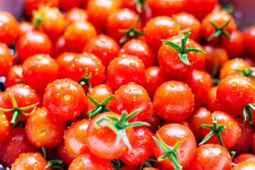 Cherry tomatoes freshly rinsed in water.