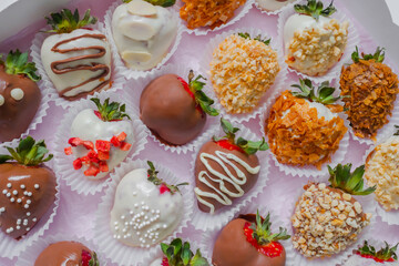 Set of different fresh chocolate covered strawberries - close up. Holiday, gift, confectionery, romantic and Valentine Day concept