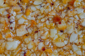 Gozinaki - honey granola hazelnuts bar- caramelized nuts fried in honey - macro, top view, close up. Traditional Georgian cuisine, gastronomy, oriental sweet and food concept