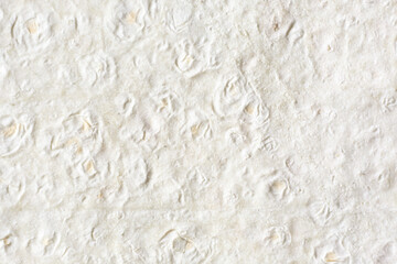 Beige dough sheet texture of Armenian Lavash bread, natural background.