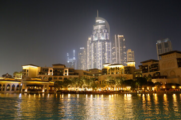 Obraz premium Dubai at night with illuminated skyscrapers