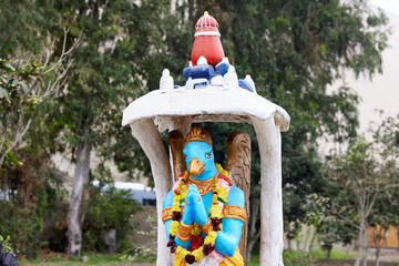 Hindu deity at the entrance of the temple