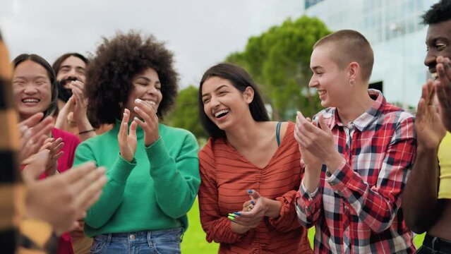 Multiethnic diverse people celebrating together outdoor - Diversity international community
