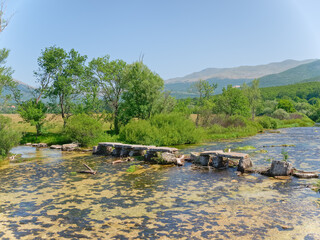 Obraz premium View of the old footbridge on the river Cetina