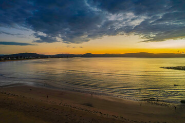 Obraz premium Aerial sunrise seascape with low clouds