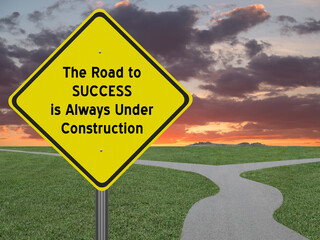 Motivational quote about success on highway sign.