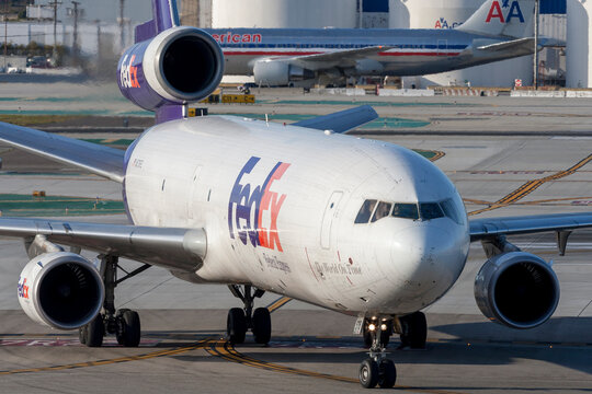 Los Angeles, California, USA - March 10, 2010: Federal Express (FedEx) McDonnell Douglas MD-11F cargo aircraft at Los Angeles International Airport.