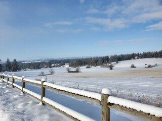snow covered fence winter landscape
